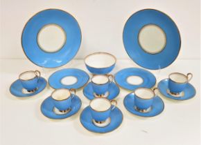 AYNSLEY PART TEA SET with a pale blue and gilt ground, comprising ten cups, twelve saucers, twelve