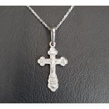 FOURTEEN CARAT WHITE GOLD CRUCIFIX PENDANT on fourteen carat white gold chain, total weight