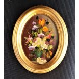 FLORAL MINIATURE PAINTING in oval gilt frame, signed Cristian, 11cm high