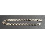 NINE CARAT GLD CURB LINK BRACELET 21.5cm long and approximately 5.7 grams