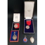 FIVE VARIOUS SILVER BADGES some with enamel decoration, including the Scottish Railway Ambulance
