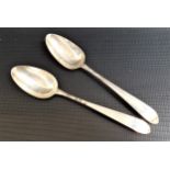 TWO GEORGE III IRISH SILVER TABLE SPOONS in the Irish Celtic Point pattern, the terminals