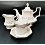 JOHNSON BROTHERS BACHELOR'S TEA SERVICE with a white ground and floral border with a green rim,