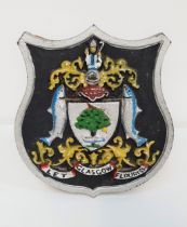 GLASGOW COAT OF ARMS on a shield shaped steel plaque with a wood stand, 18cm high