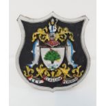 GLASGOW COAT OF ARMS on a shield shaped steel plaque with a wood stand, 18cm high