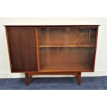 MAHOGANY SIDE CABINET with a cupboard door and a pair of glass sliding doors, standing on shaped