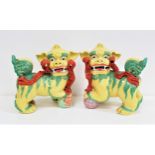 PAIR OF CHINESE PORCELAIN DOGS OF FO both decorated in yellow and green with red porcelain
