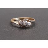 DIAMOND THREE STONE RING on eighteen carat gold shank with twist setting, ring size L and