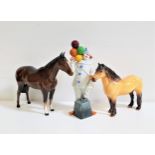 ROYAL DOULTON BALLOON CLOWN FIGURINE HN2894, 23.5cm high, a Beswick Highland pony, 17.5cm high and a