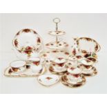 ROYAL ALBERT OLD COUNTRY ROSES TEA SET comprising a three tier cake stand, six cups, eight