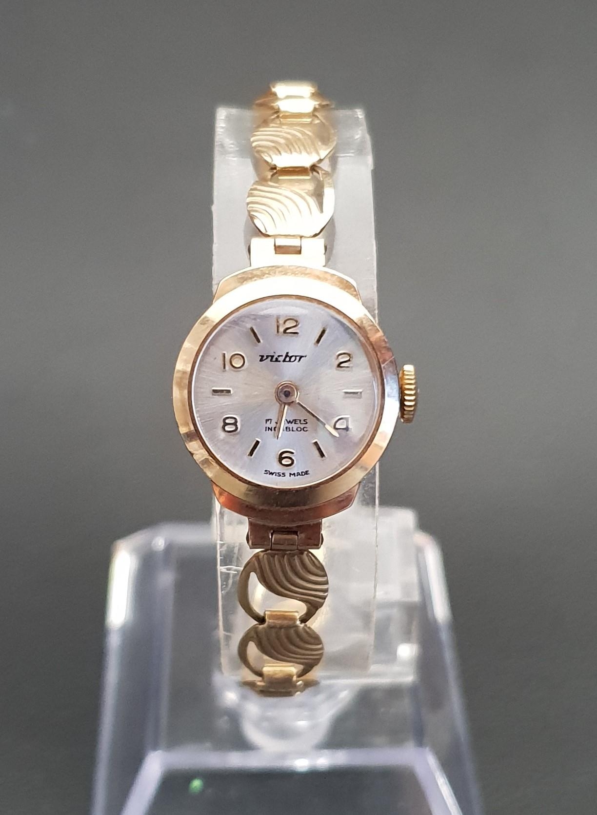 LADIES NINE CARAT GOLD CASED VICTOR WRISTWATCH the circular silvered dial with alternating Arabic - Image 2 of 2