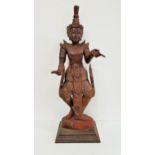 LARGE CARVED WOOD BALINESE DEITY FIGURE the painted figure with pointing finger to the left hand,