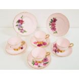 TUSCAN CHINA TEA SET decorated with a pink ground with gilt highlights with some saucers and side