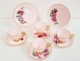 TUSCAN CHINA TEA SET decorated with a pink ground with gilt highlights with some saucers and side