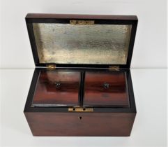 19th CENTURY ROSEWOOD TEA CADDY with a domed lid opening to reveal a foil lined interior and two