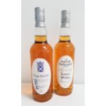 TWO BOTTLES OF SIGNED BLENDED SCOTCH WHISKY comprising one bottle of The Scottish Parliament