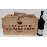 TAYLORS 1994 VINTAGE PORT twelve bottles, bottled in1996, in wooden crate