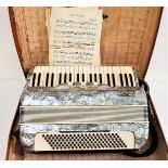 GALANTIO ACCORDIAN with a mottled grey body with shoulder straps and travel case, with a selection