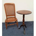 VICTORIAN WALNUT OCCASIONAL TABLE with a circular moulded and inlaid top on a turned column and