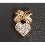PAVE SET HEART SHAPED PENDANT the heart surmounted by a cross motif, in fourteen carat gold, 1.3cm