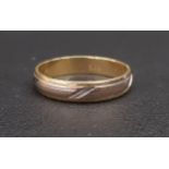 FOURTEEN CARAT GOLD WEDDING BAND in white and yellow gold and with engraved detail, ring size V-W