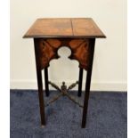 EDWARDIAN MAHOGANY SIDE TABLE the square top decorated with holly leaves above a shaped four sided