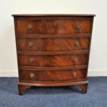 MAHOGANY BOW FRONT CHEST with a moulded top above four cockbeaded drawers, standing on bracket feet,
