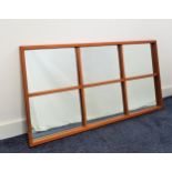 TEAK WALL MIRROR with a trellis type frame over a plain plate, 56cm x 109cm