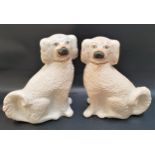 PAIR OF 19th CENTURY WALLY DOGS modelled as seated spaniels, 32cm high (2)