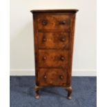 LATE 19th CENTURY FIGURED WALNUT CHEST of narrow proportions with a moulded top above four