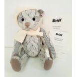 LIMITED EDITION STEIFF TEDDY BEAR NICHOLAS in pattered grey and wearing a cream scarf and hat,