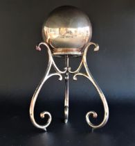 GEORGE V SILVER BOWLING JACK on a silver plated triform stand, Birmingham 1929 and both by Joseph