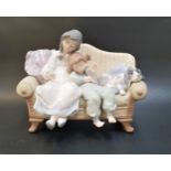 LLADRO BIG SISTER FIGURE GROUP number 5735, depicting children and a dog seated on a sofa, 21cm wide