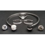 SELECTION OF SWAROVSKI JEWELLERY comprising a crystal ball finial bangle, a pair of earrings and a