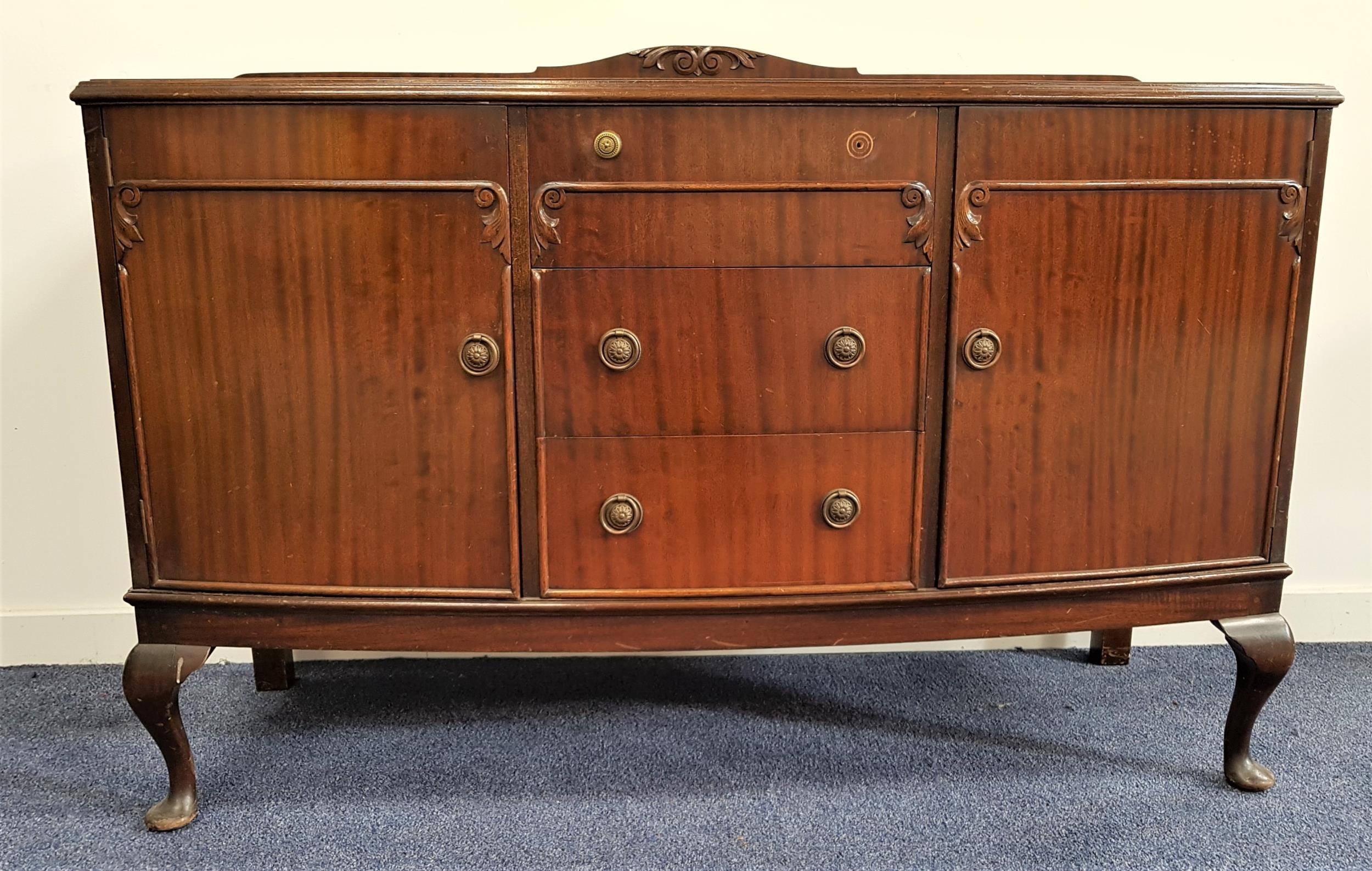 BOW FRONT MAHOGANY SIDEBOARD with a shaped raised back above three central drawers flanked by a pair