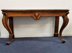 VICTORIAN OAK SERVING TABLE now lacking its raised back, with a moulded top above a central carved