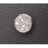 PAVE SET DIAMOND CIRCULAR PENDANT in fourteen carat white gold, 0.7cm diameter