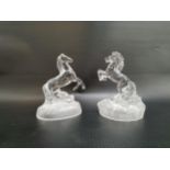 TWO FRENCH CRYSTAL HORSES both rearing up and on oval bases, 16cm high (2)