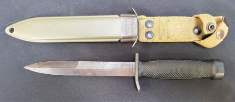 WEST GERMAN M-3 MILITARY KNIFE with a black steel stilleto 17cm blade and chequered black grip, in a