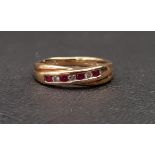 CHANNEL SET DIAMOND AND RUBY RING the diamonds totalling approximately 0.07cts, in nine carat gold