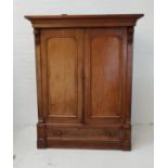 VICTORIAN MAHOGANY WARDROBE with a moulded cornice above a pair of arched panelled doors flanked