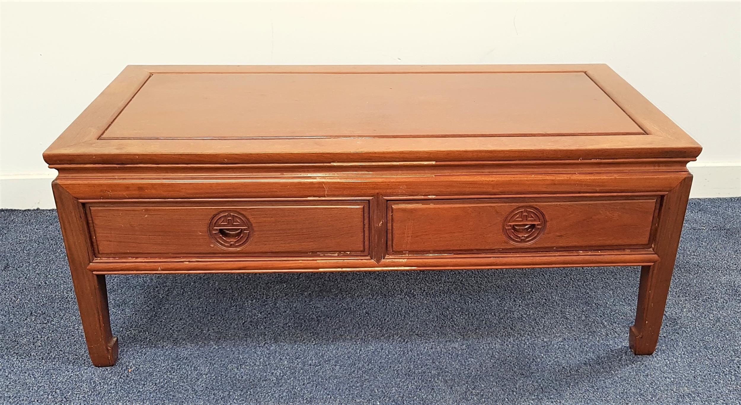 CHINESE TEAK LOW OCCASIONAL TABLE with a rectangular top above two panelled frieze drawers, standing - Image 2 of 2