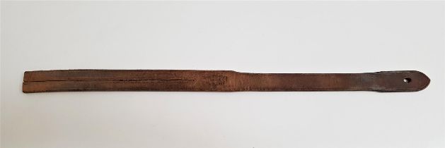 DOUBLE TOUNGE LEATHER TAWSE marked John J. Dick, Lochgelly and JG in biro to the back, 61cm long,