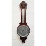 MAHOGANY CASED ANEROID WHEEL BAROMETER with a thermometer on a silvered scale above a circular