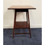 EDWARDIAN MAHOGANY AND INLAID WINDOW TABLE with a square moulded top standing on tapering supports