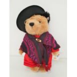 LIMITED EDITION STEIFF AUNT LUCY BEAR in mohair and wearing a dress, shawl, hat and glasses,