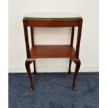 MAHOGANY SIDE TABLE the shaped moulded bow front top with a shelf below, standing on cabriole