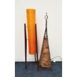 VINTAGE NOVOPLAST ROCKET FLOOR LAMP with a cylindrical orange fiberglass body on three shaped teak