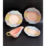H. WAIN & SONS MELBA WARE POTTERY FISH SERVICE with a salmon pink ground decorated with salmon,