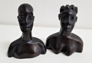 PAIR OF CARVED AFRICAN EBONY BUSTS depicting a man and woman, the bases marked NBCI, 16cm high